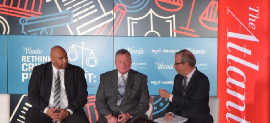 Mayor Kenney is flanked by John Wetzel on the left and Ron Brownstein on the right