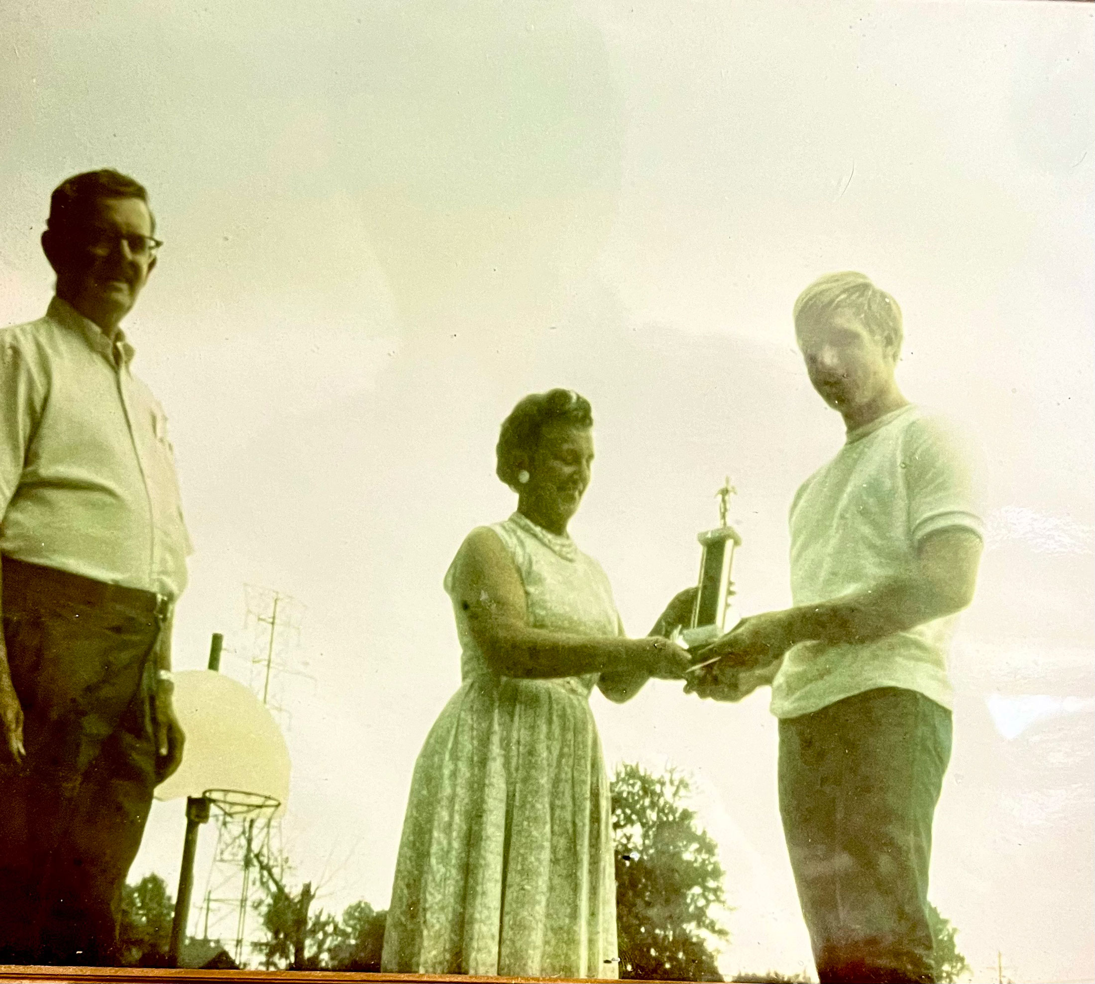 Future Bridgeton Township Supervisor Roger Keller receives a caber tossing trophy.