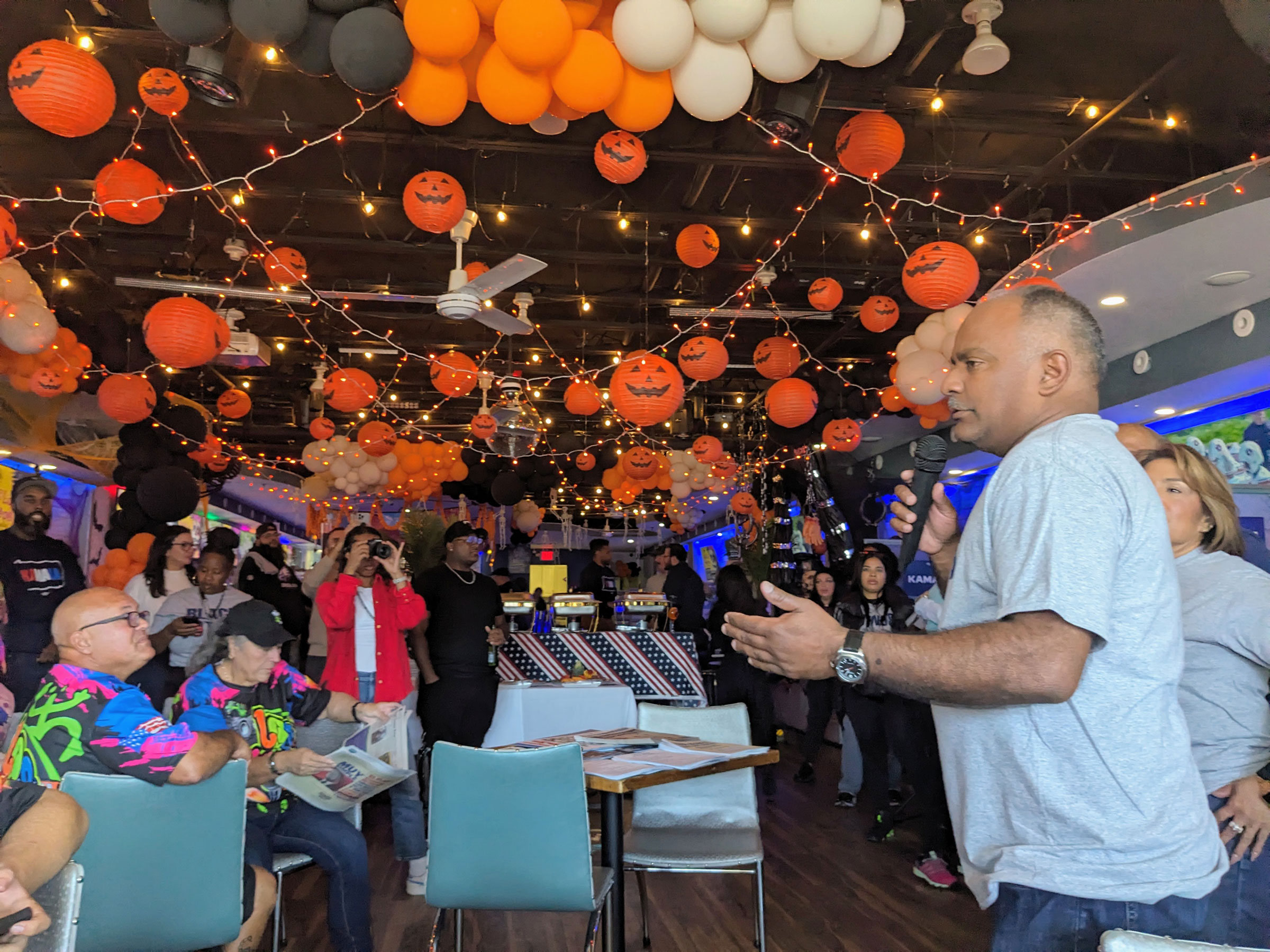 Danilo Burgos addresses a North Philly Latinos for Harris block party.