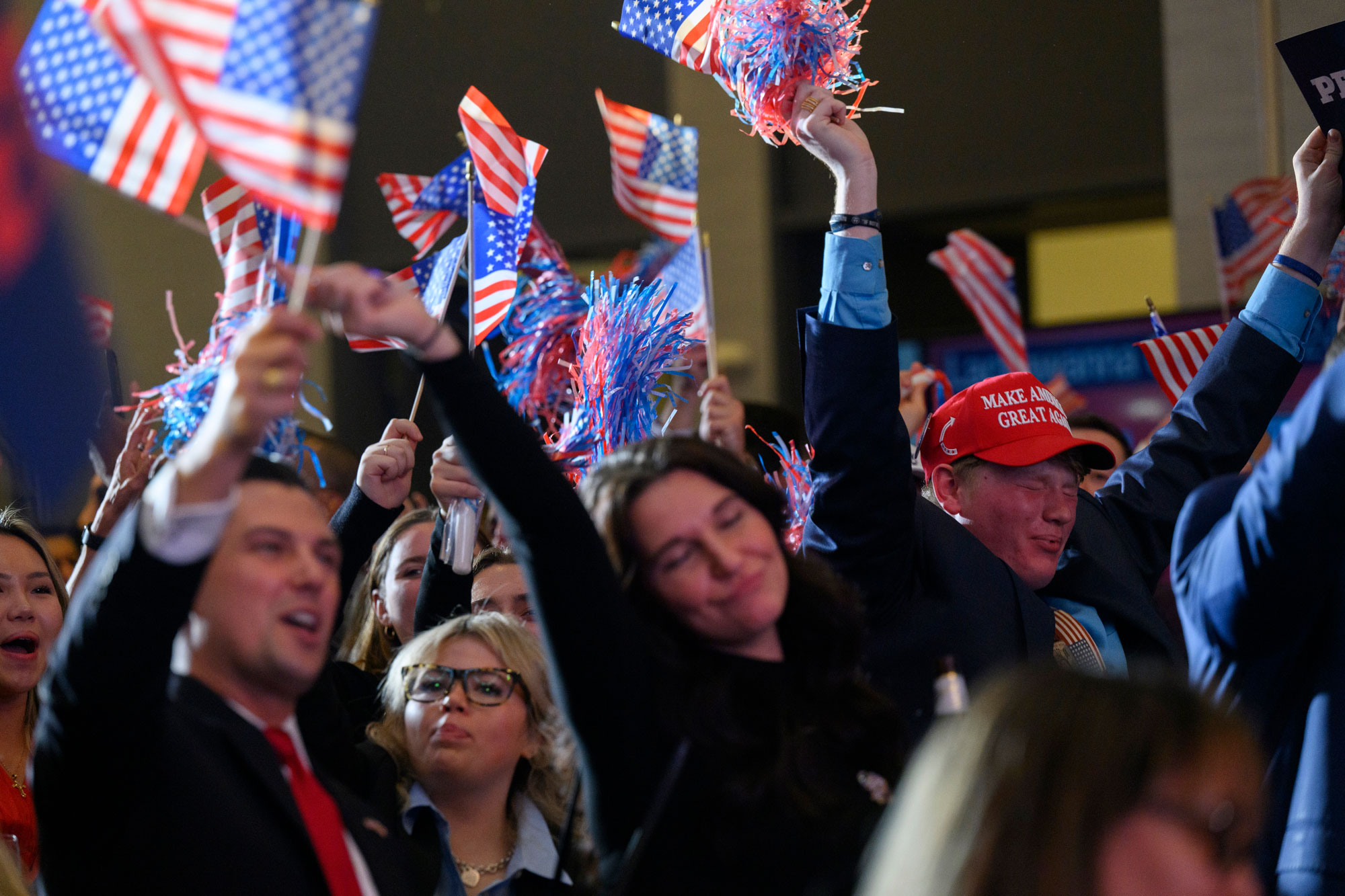 Attendees get into the spirit of a rally for GOP U.S. Senate candidate Dave McCormick.